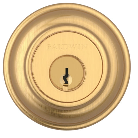 Close-up of Baldwin Reserve SC.TRD.044 Deadbolt keyhole and turn-piece mechanism in Satin Brass finish Close-up of Baldwin Reserve SC.TRD.044 Deadbolt keyhole and turn-piece mechanism in Satin Brass finish