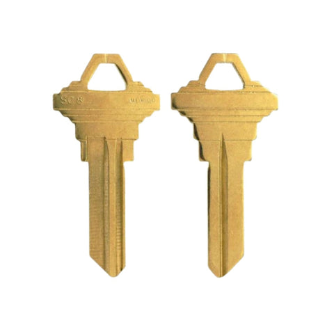Close-up of ILCO NB-SC8 key blank with brass finish and neuter bow design Close-up of ILCO NB-SC8 key blank with brass finish and neuter bow design