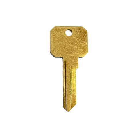 Close-up of ILCO NB-Y1 key blank, showcasing durable brass construction Close-up of ILCO NB-Y1 key blank, showcasing durable brass construction