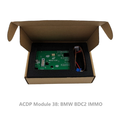 Open box containing the Yanhua ACDP Module 38 BMW BDC2-ICP IMMO board with foam packaging and included wiring accessories. Open box containing the Yanhua ACDP Module 38 BMW BDC2-ICP IMMO board with foam packaging and included wiring accessories.